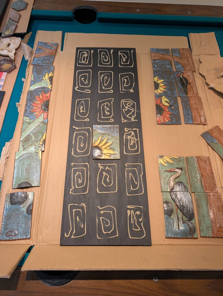 construction adhesive on mounting board for sculpture tiles